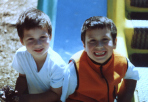 with my brother Zach on the slide at the park 2001